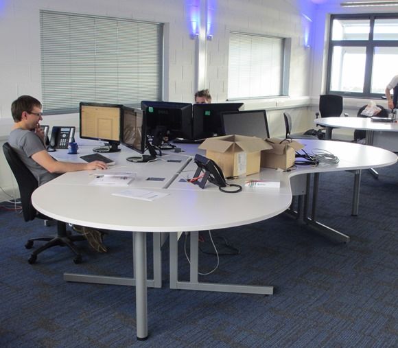 White desks in IT Development Offices