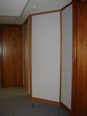 Solid Partitioning With Cherry Doors and Trims