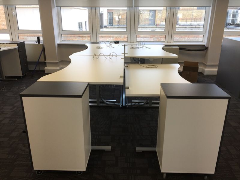 End View of Sit Stand Desks