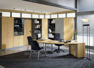 Use Of Storage Wall Cupboards To Create An Office