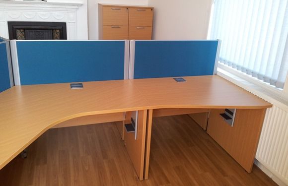 Wave desks linked to 120 degree desks