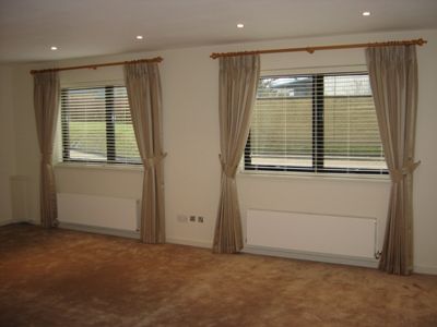 Wooden Venetian Blinds and Co-Ordinated Curtains in VIP Lounge