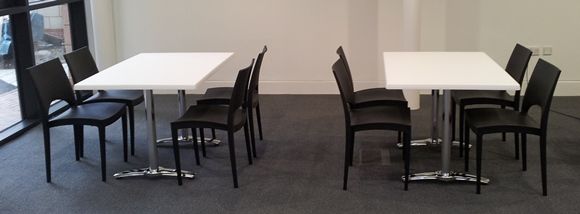 Two Cafe Tables With Black Moon Cafe Chairs