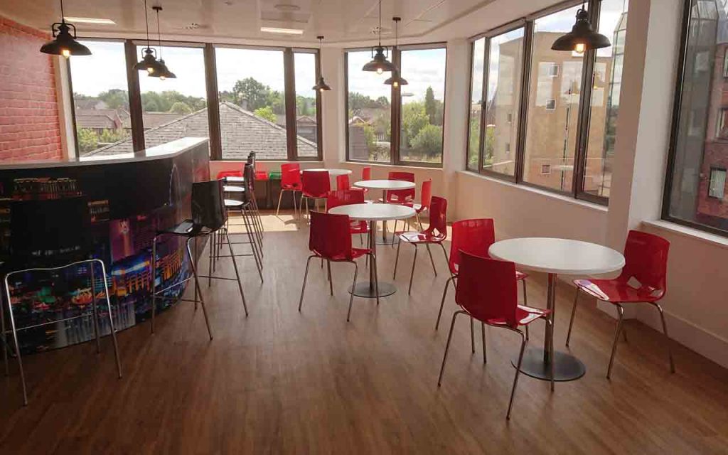 Staff Break Out area in Crawley business, featuring Fondo cafe chairs and bar stools, installed by Aerofoil Design.
