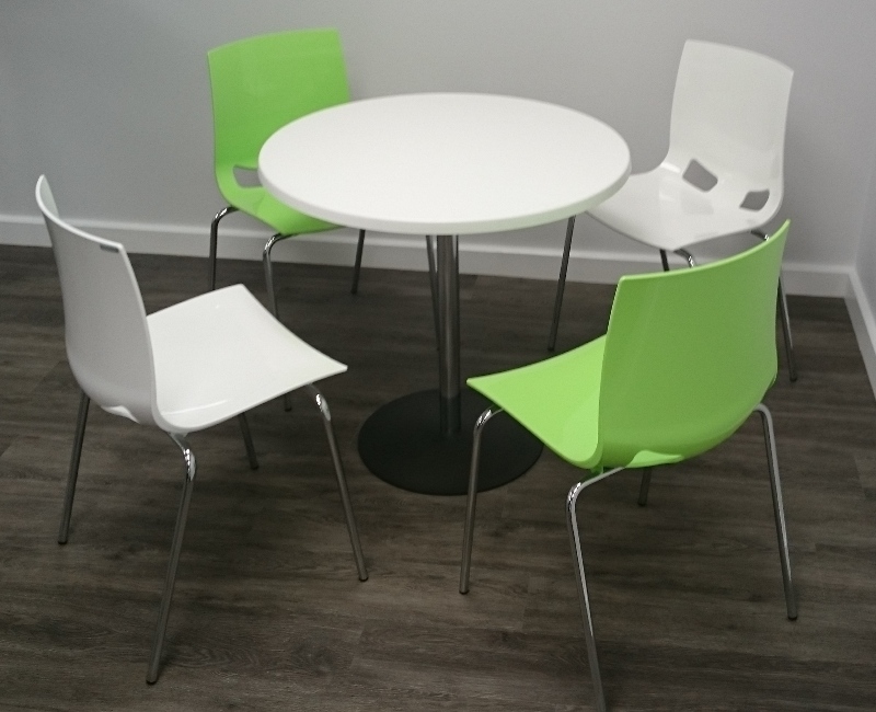 Fondo cafe chairs in white and lime green, around white Lena table