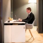 A Sit-Stand Office Desk In A Cupboard